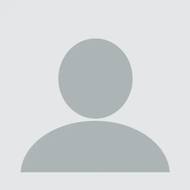 Default user profile silhouette on gray background.